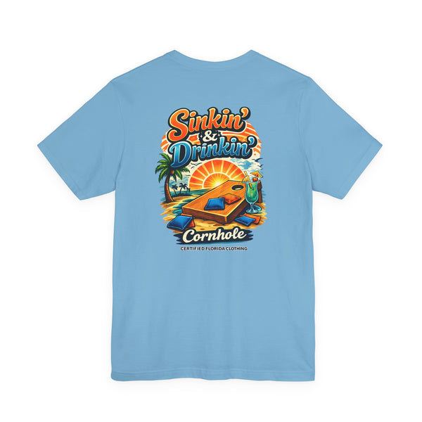 Cornhole T-Shirt — "Sinkin' & Drinkin'" Tropical Sunset Game Tee